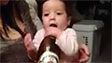 Little baby knows beer is the best drink